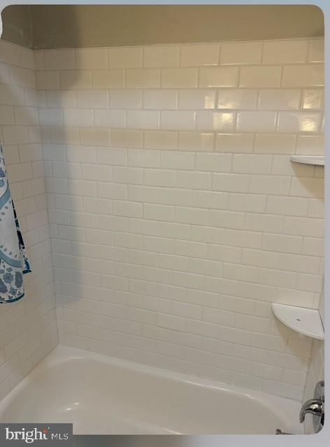2800 Linwood Avenue, Unit C Baltimore, MD 21234 - Photo 12 of 18 a close up of a bathtub in a bathroom