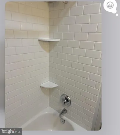 a bathroom with a bathtub