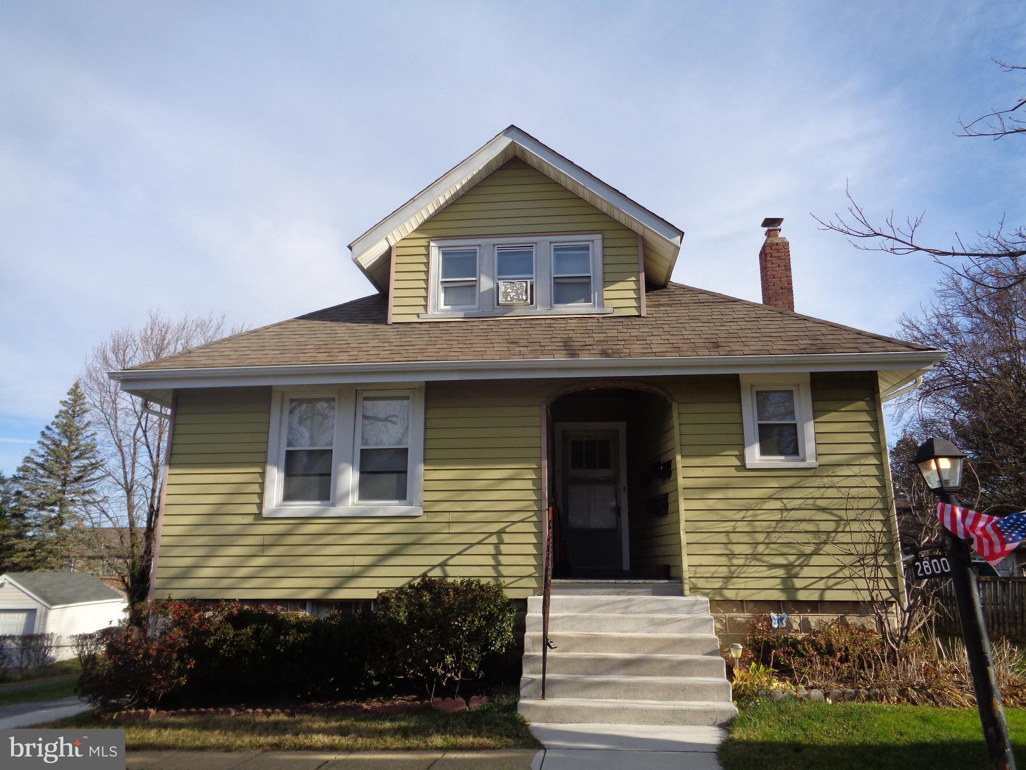 2800 Linwood Avenue, Unit C Baltimore, MD 21234 - Photo 18 of 18 a front view of a house with a yard