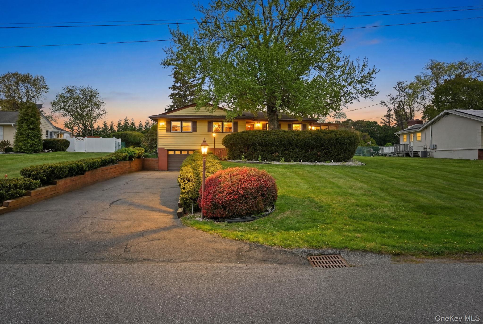 93 Fairmont Road Mahopac, NY 10541 - Photo 1 of 37 a view of a street with a building and trees in the background