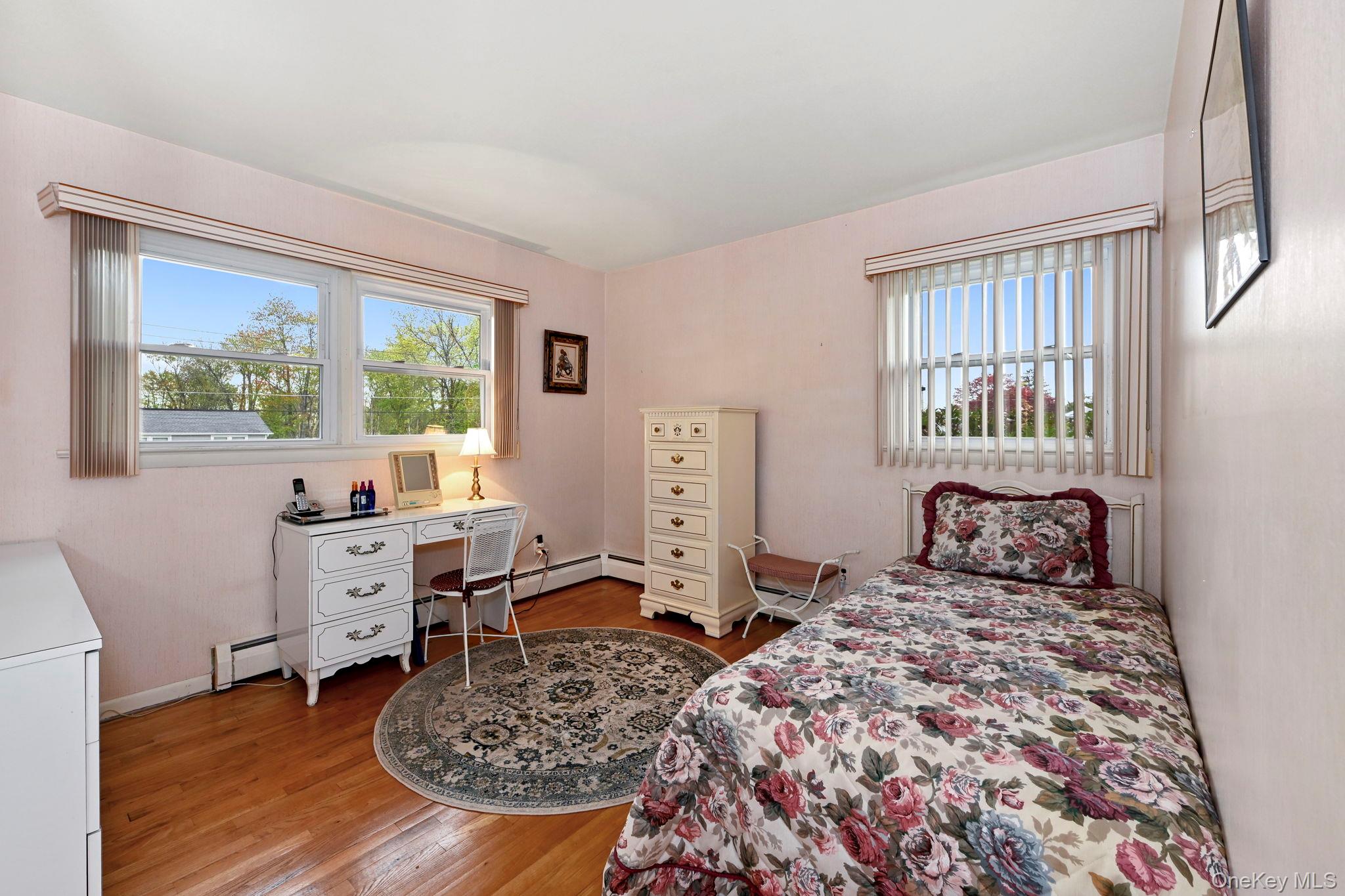 93 Fairmont Road Mahopac, NY 10541 - Photo 16 of 37 a bed sitting in a bedroom next to a window