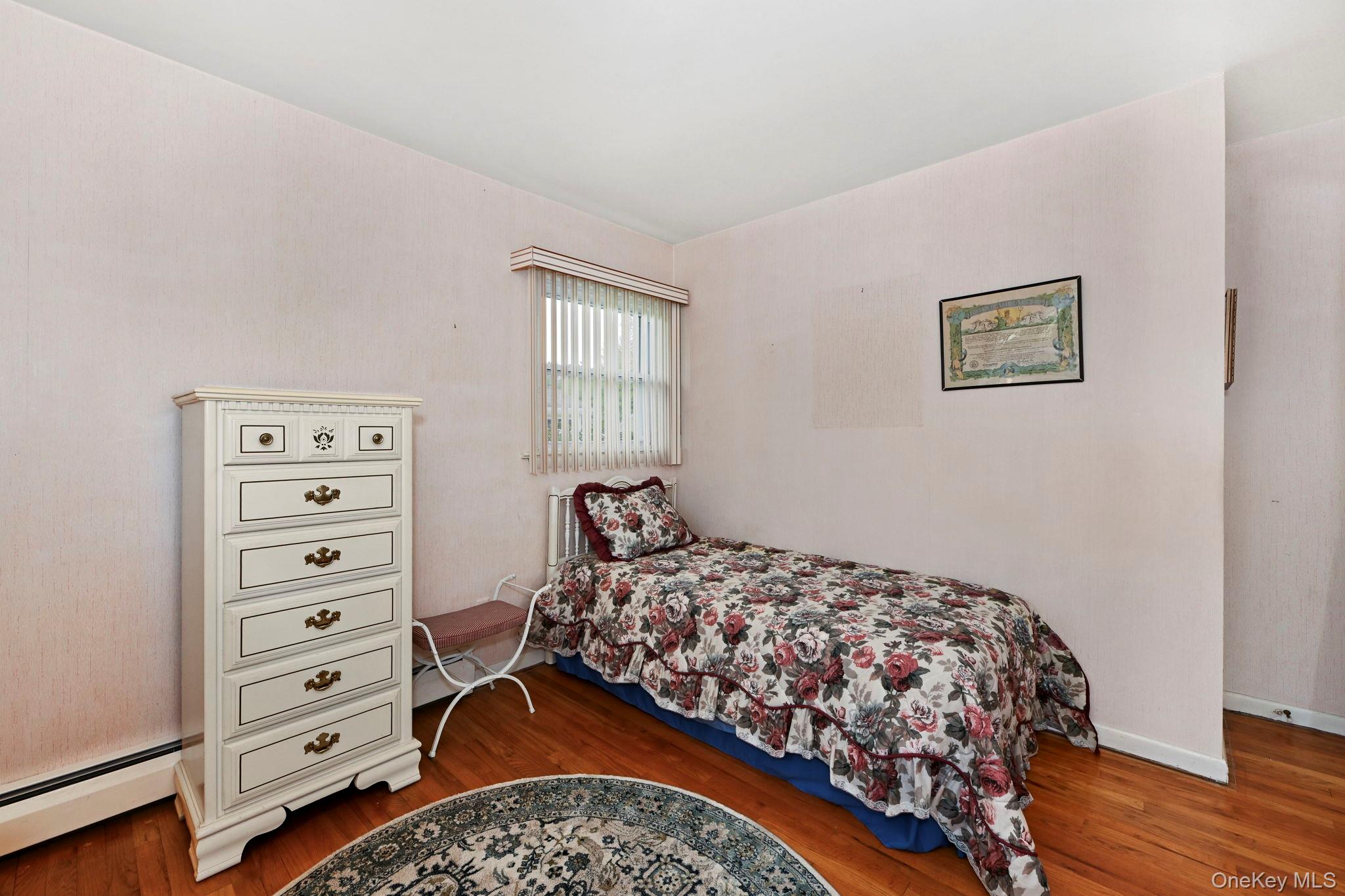 93 Fairmont Road Mahopac, NY 10541 - Photo 17 of 37 a bedroom with a bed and a dresser