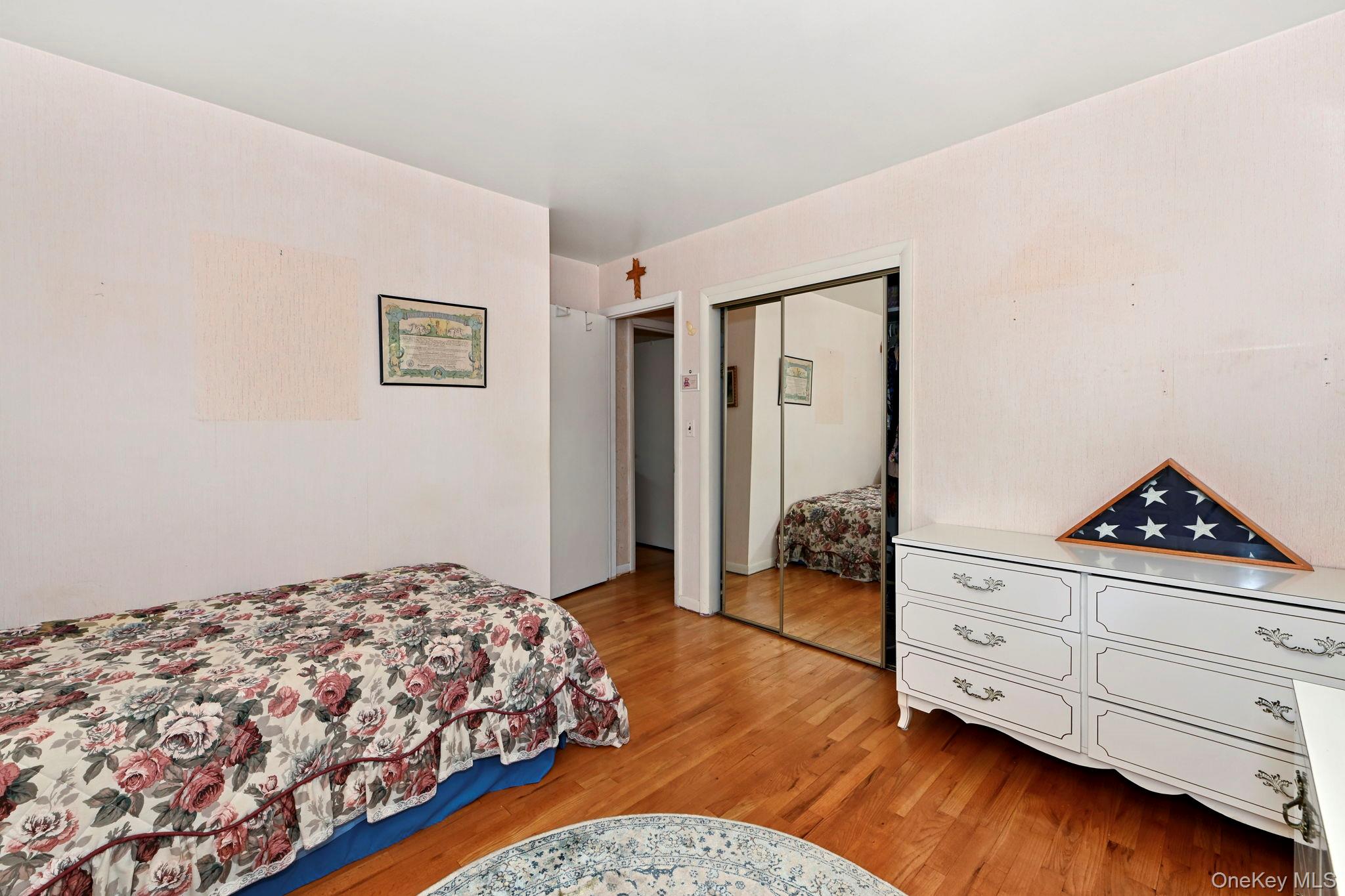 93 Fairmont Road Mahopac, NY 10541 - Photo 18 of 37 a bedroom with a bed and wooden floor