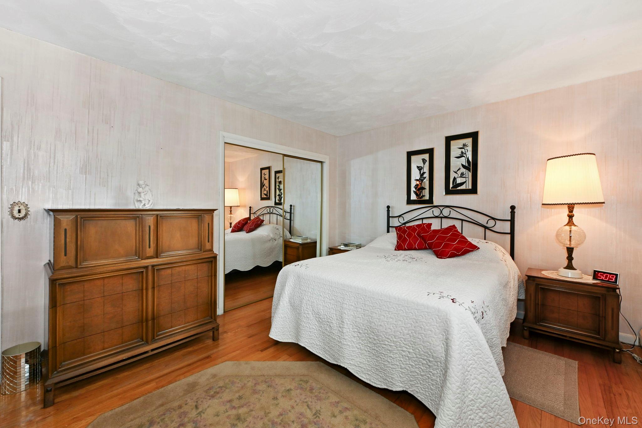 93 Fairmont Road Mahopac, NY 10541 - Photo 19 of 37 a bedroom with a bed and wooden floor