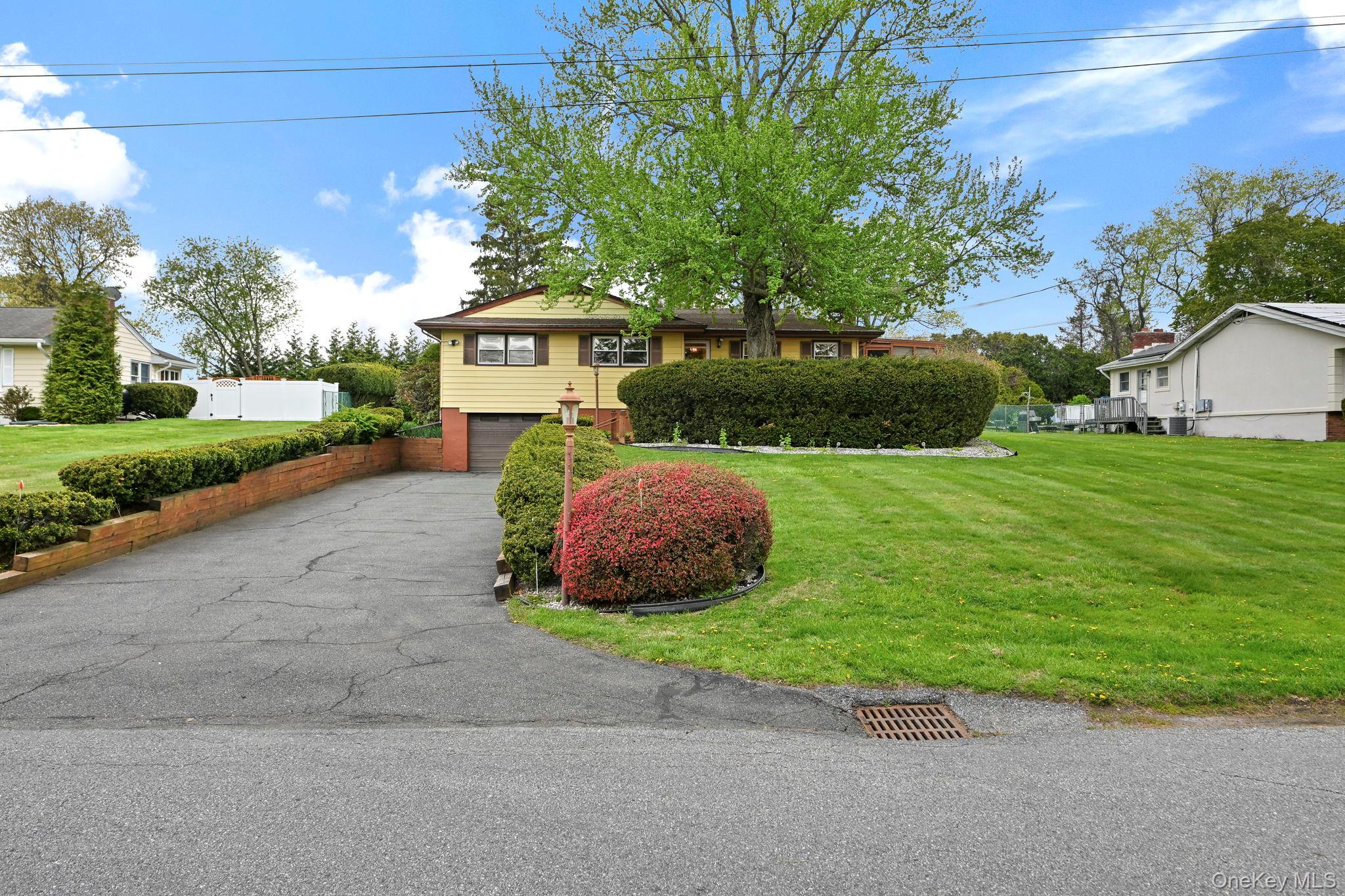 93 Fairmont Road Mahopac, NY 10541 - Photo 2 of 37 a view of a house with backyard and garden
