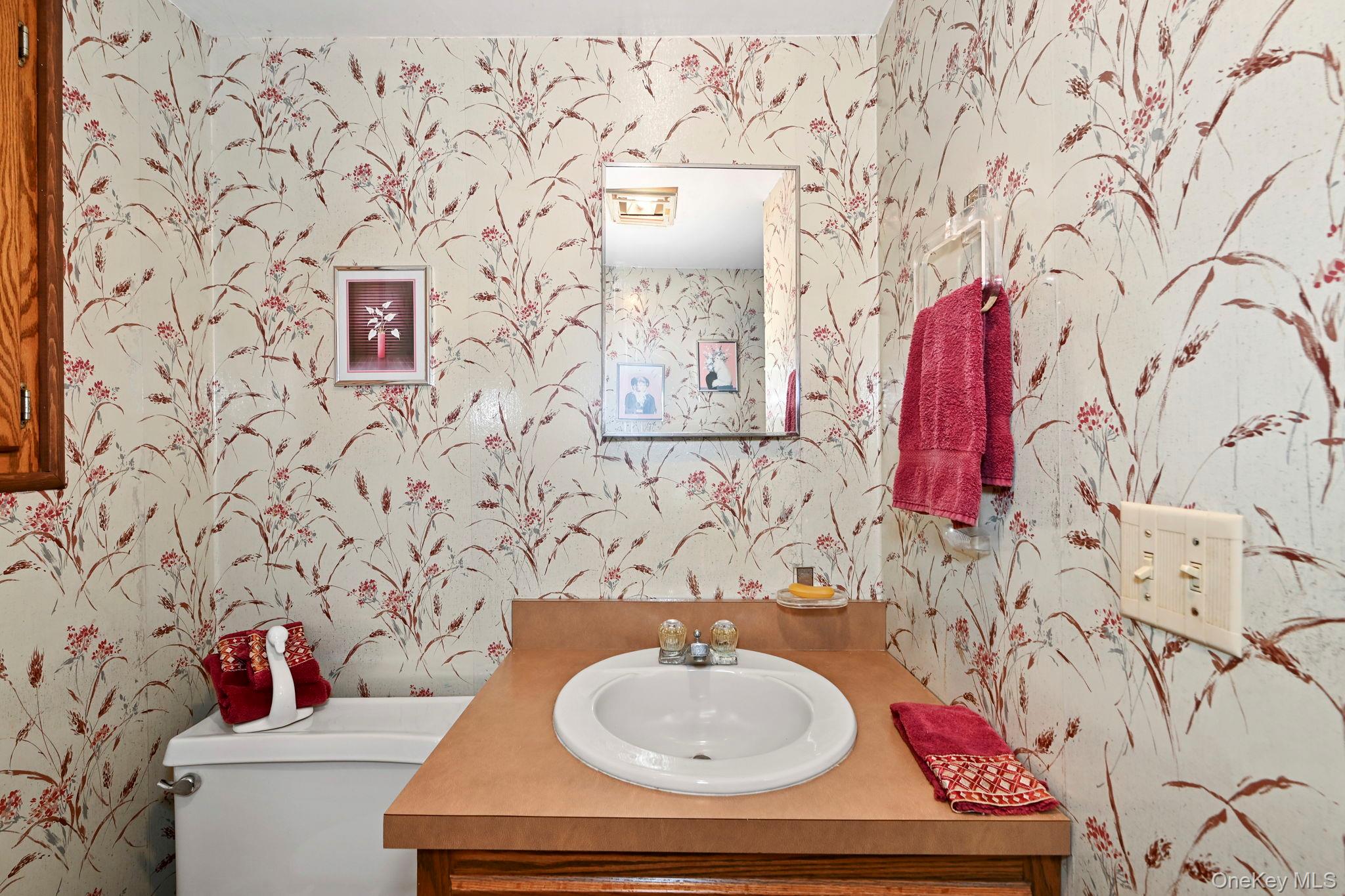 93 Fairmont Road Mahopac, NY 10541 - Photo 23 of 37 a bathroom with a sink and a mirror