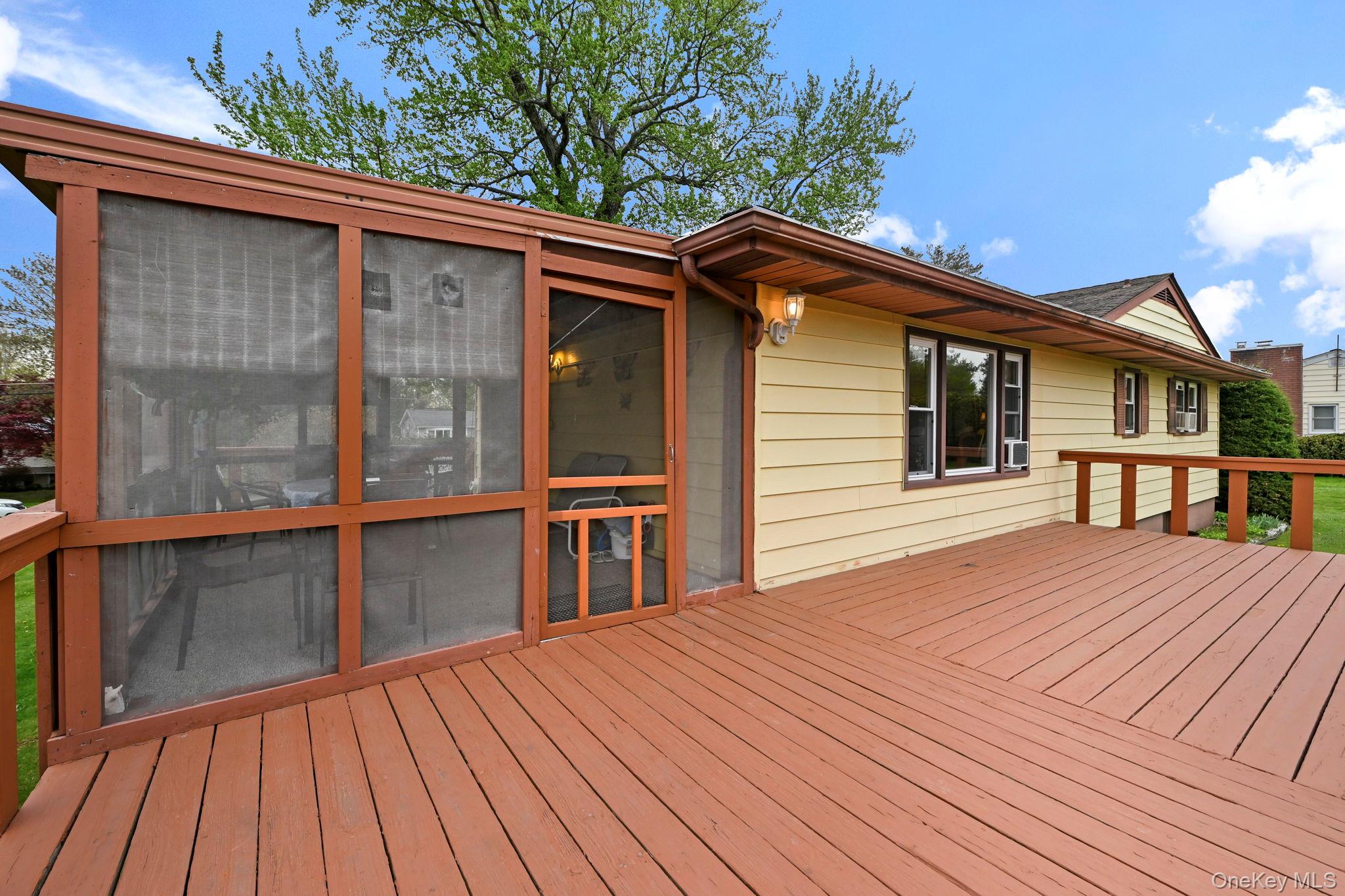 93 Fairmont Road Mahopac, NY 10541 - Photo 26 of 37 a backyard of a house with wooden floor