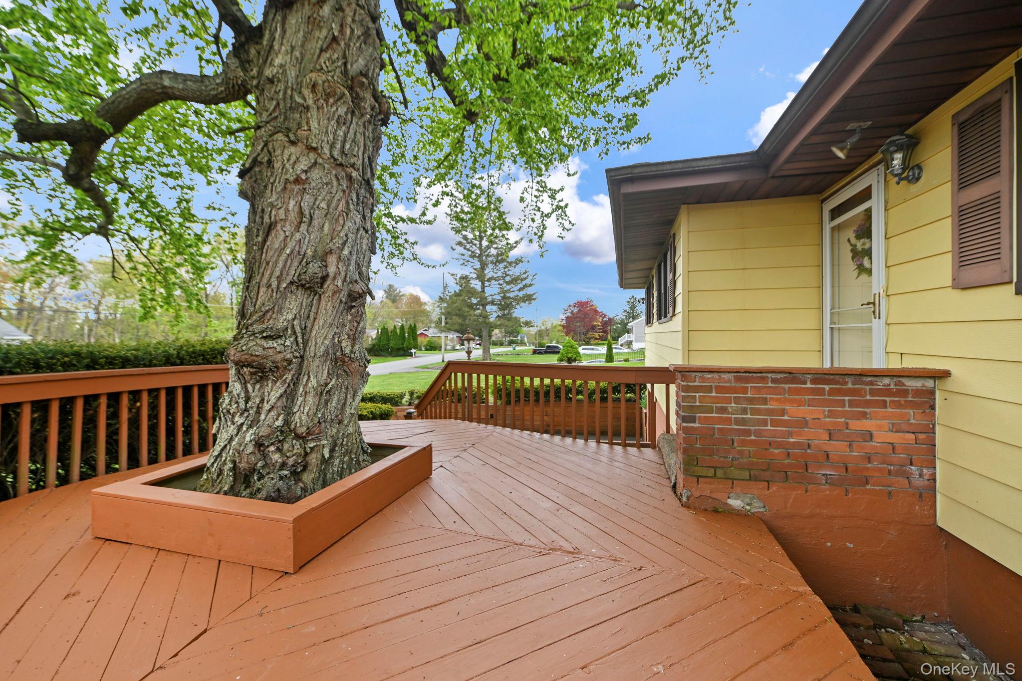 93 Fairmont Road Mahopac, NY 10541 - Photo 4 of 37 a view of a chairs on a deck