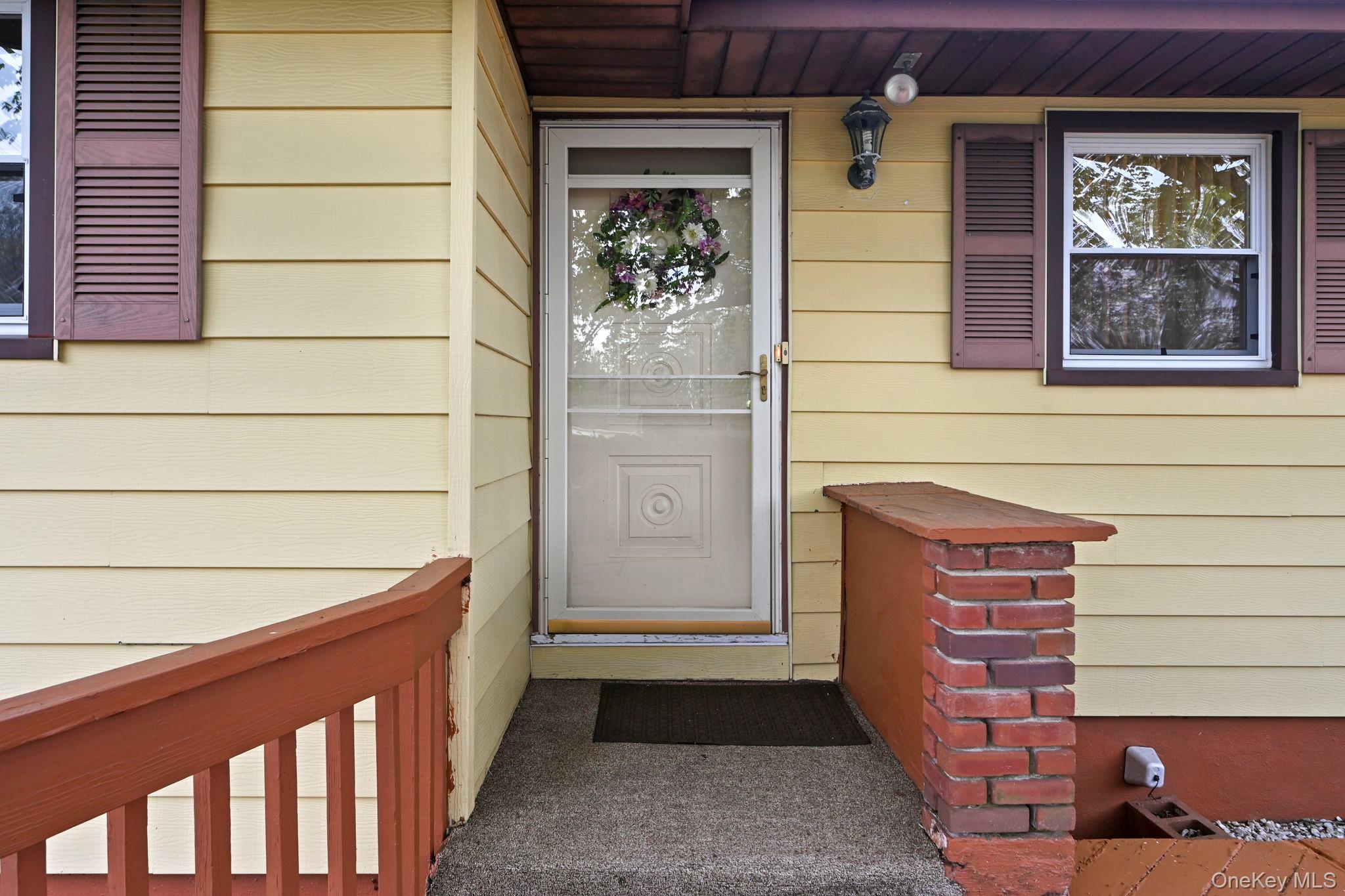 93 Fairmont Road Mahopac, NY 10541 - Photo 6 of 37 a view of front door of house with a window