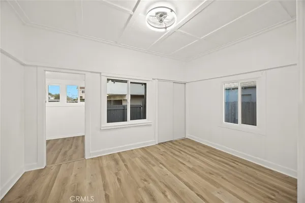 an empty room with windows