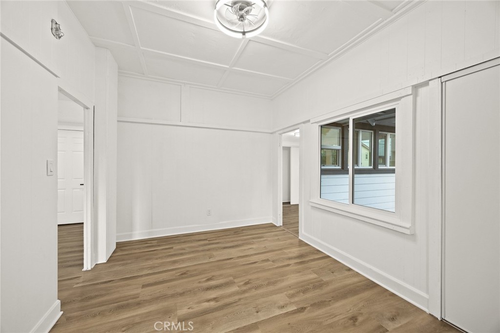 1412 Larch Street Alhambra, CA 91801 - Photo 12 of 28 a view of an empty room with wooden floor and a window