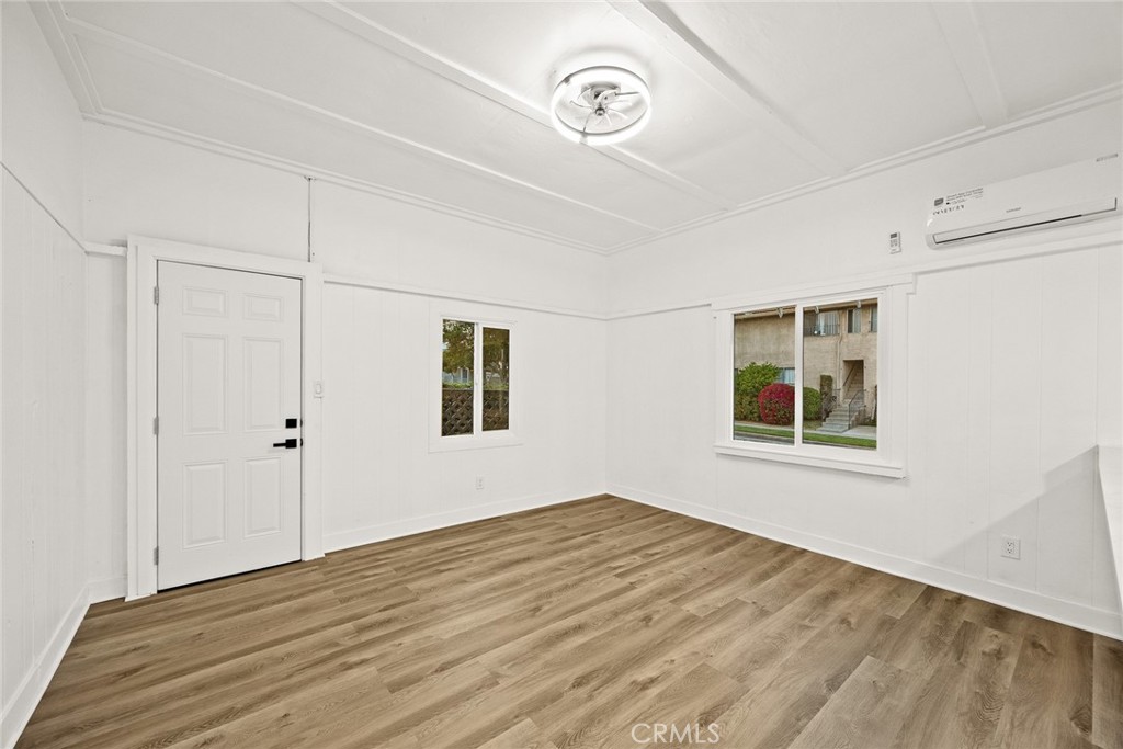 1412 Larch Street Alhambra, CA 91801 - Photo 5 of 28 a view of a big room with wooden floor and windows