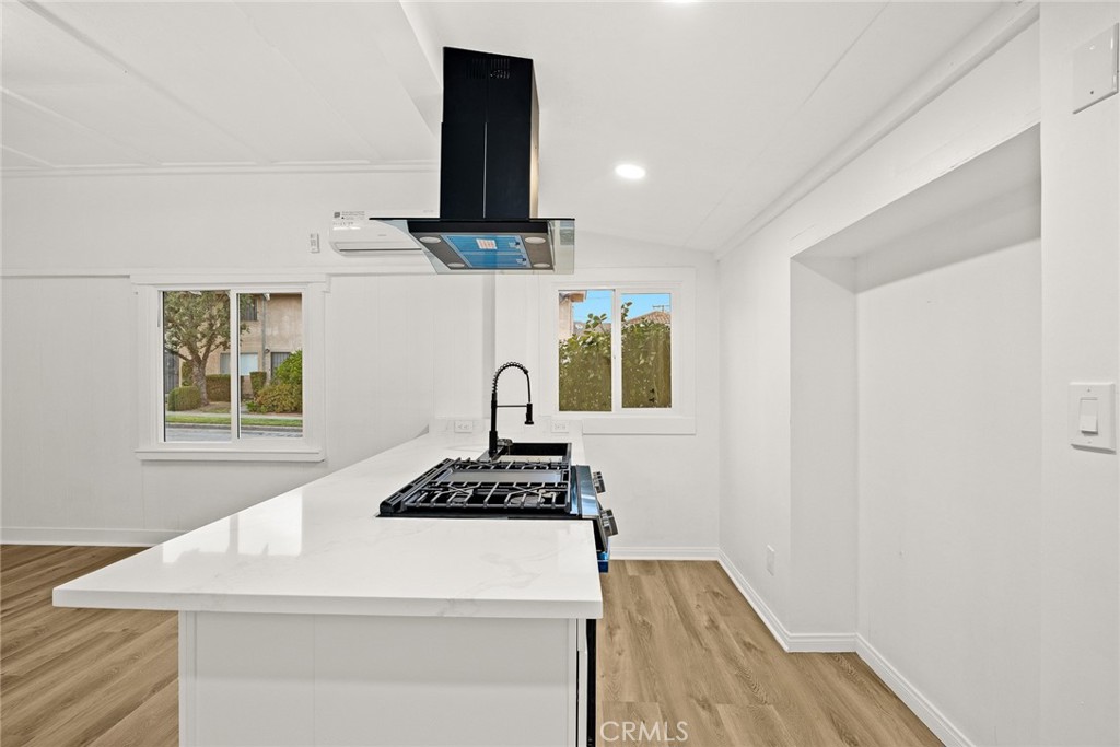 1412 Larch Street Alhambra, CA 91801 - Photo 7 of 28 a kitchen with a stove and a window