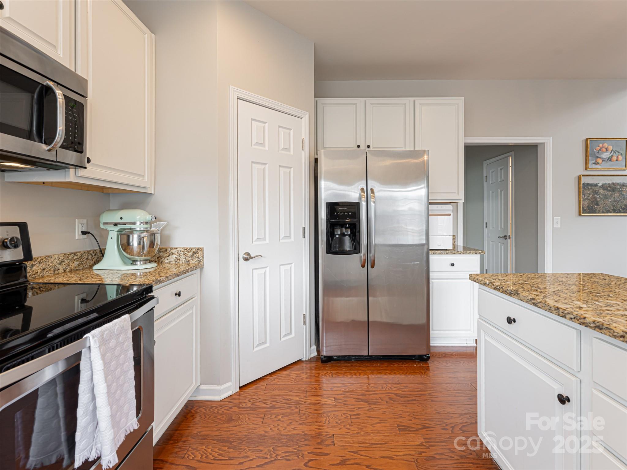 289 Roanoke Road Fletcher, NC 28732 - Photo 16 of 39 a kitchen with stainless steel appliances granite countertop a refrigerator and a sink