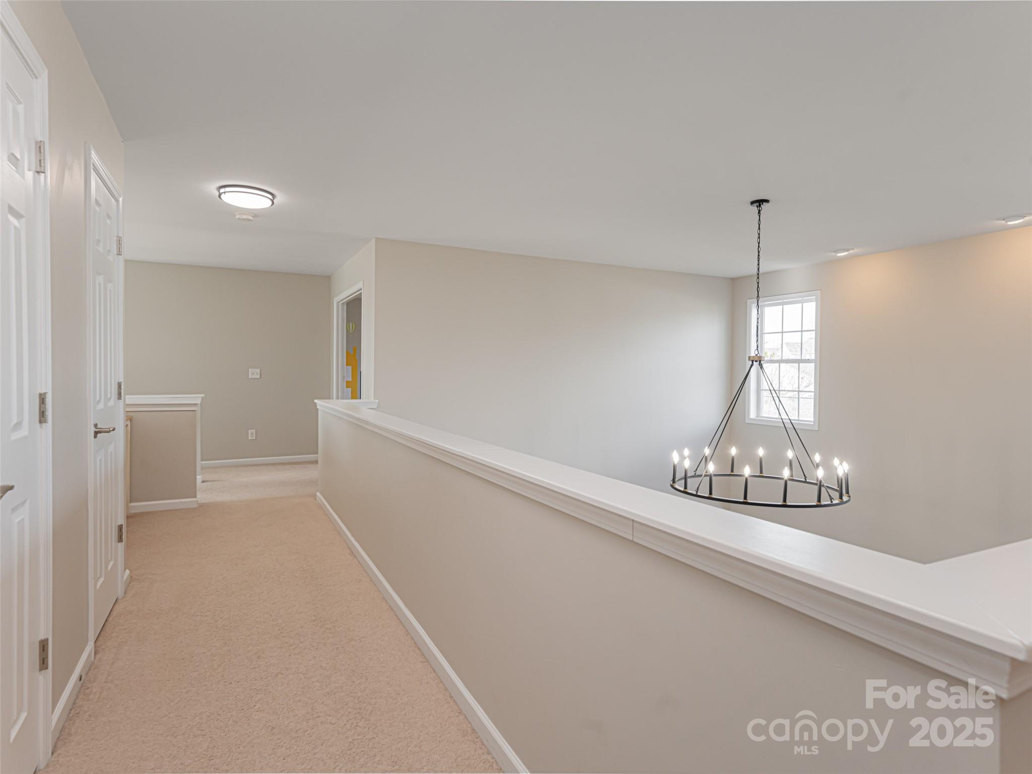 289 Roanoke Road Fletcher, NC 28732 - Photo 25 of 39 a view of an empty room with chandelier