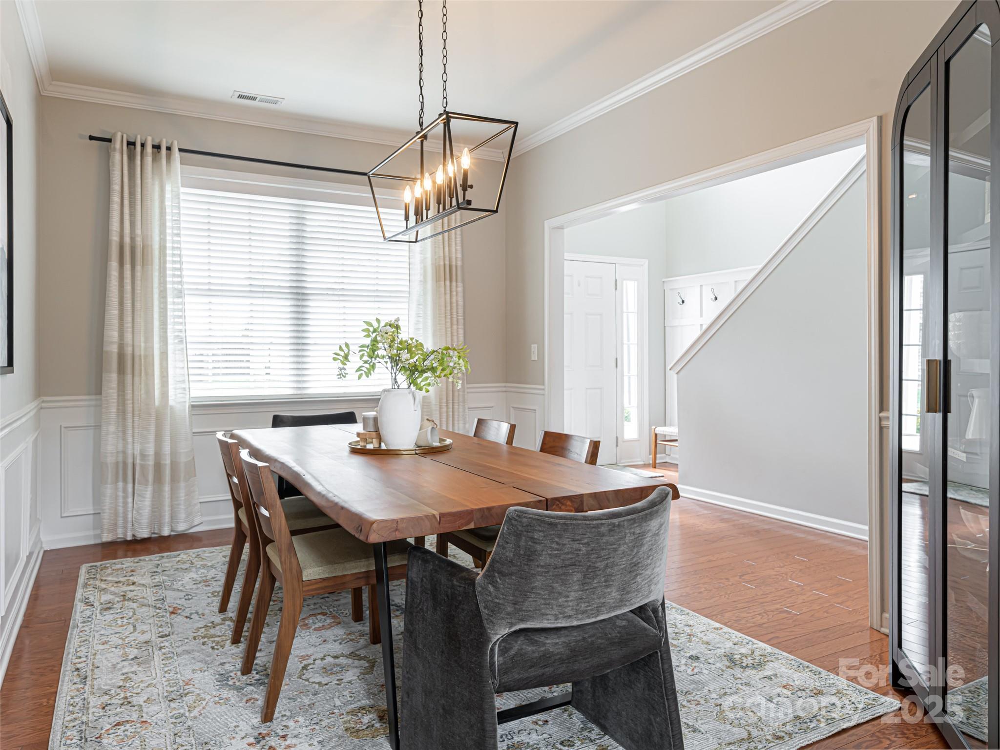 289 Roanoke Road Fletcher, NC 28732 - Photo 7 of 39 a view of a dining room with furniture window and wooden floor