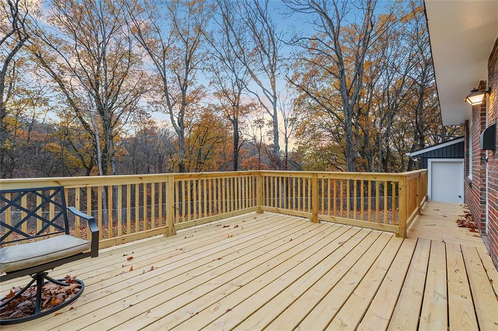 924 Old Hills Road McKeesport, PA 15135 - Photo 3 of 20 a view of deck with wooden floor and fence