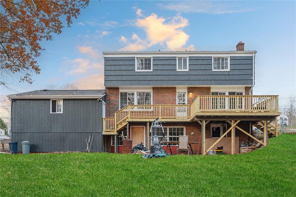 924 Old Hills Road McKeesport, PA 15135 - Photo 4 of 20 a view of an apartment with a table and chairs