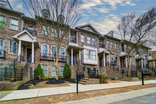 a front view of a houses on street