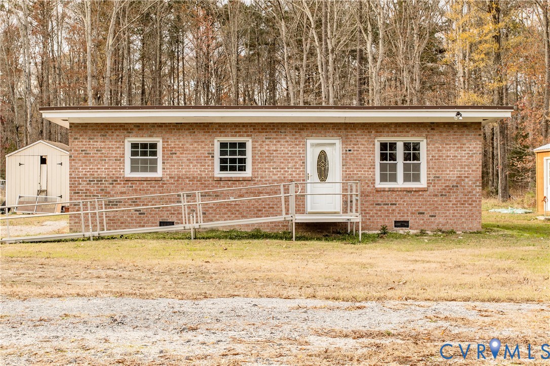 11512 Duncan Road Petersburg, VA 23805 - Photo 18 of 19 a view of a house with a swimming pool