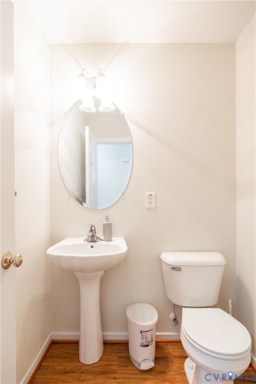 2928 Heather Ridge Drive Henrico, VA 23231 - Photo 17 of 34 White pedestal sink with a chrome faucet, oval mir