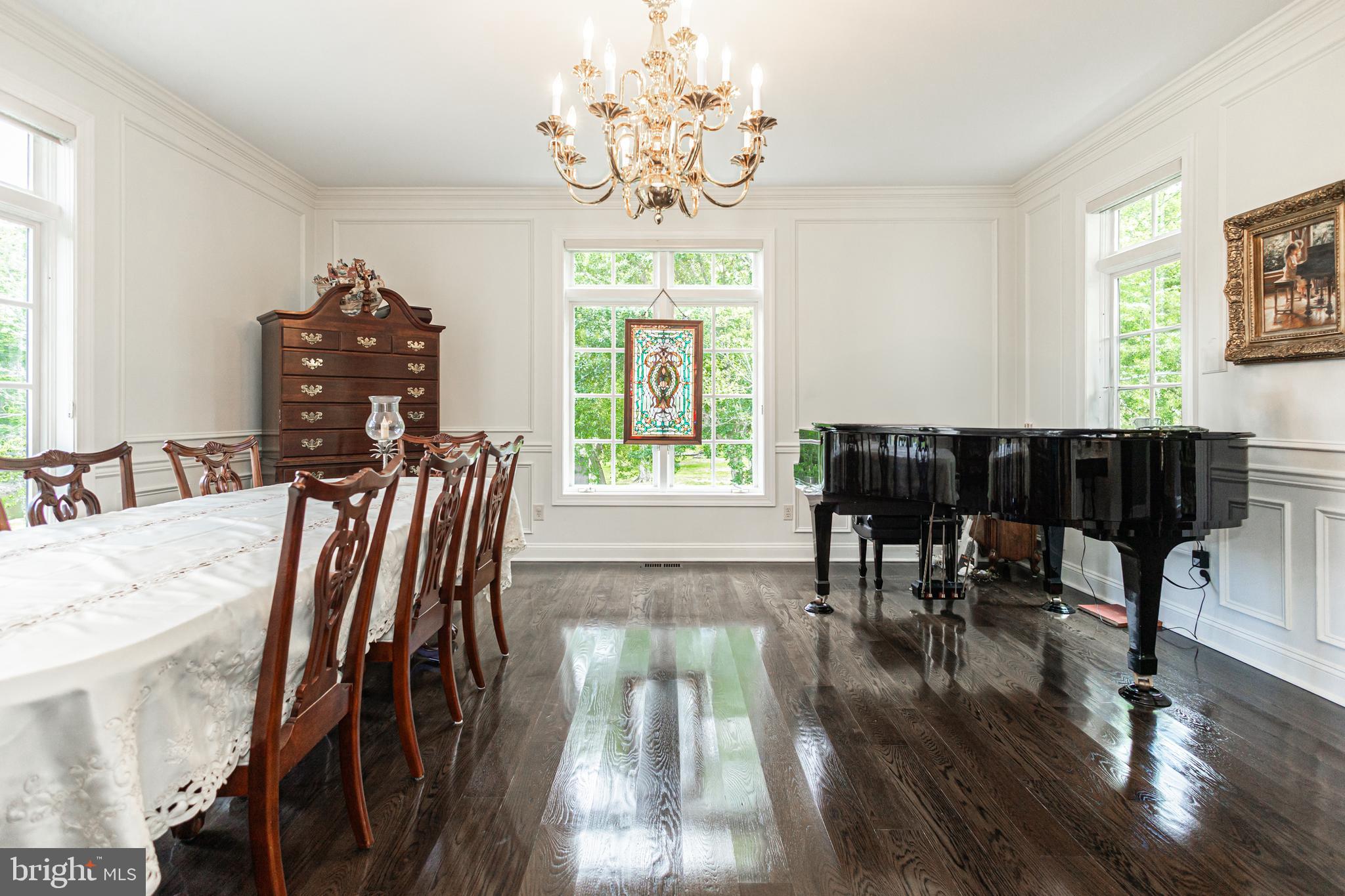 3380 Indian Springs Road Doylestown, PA 18902 - Photo 16 of 57 a view of a dining room with furniture window and wooden floor