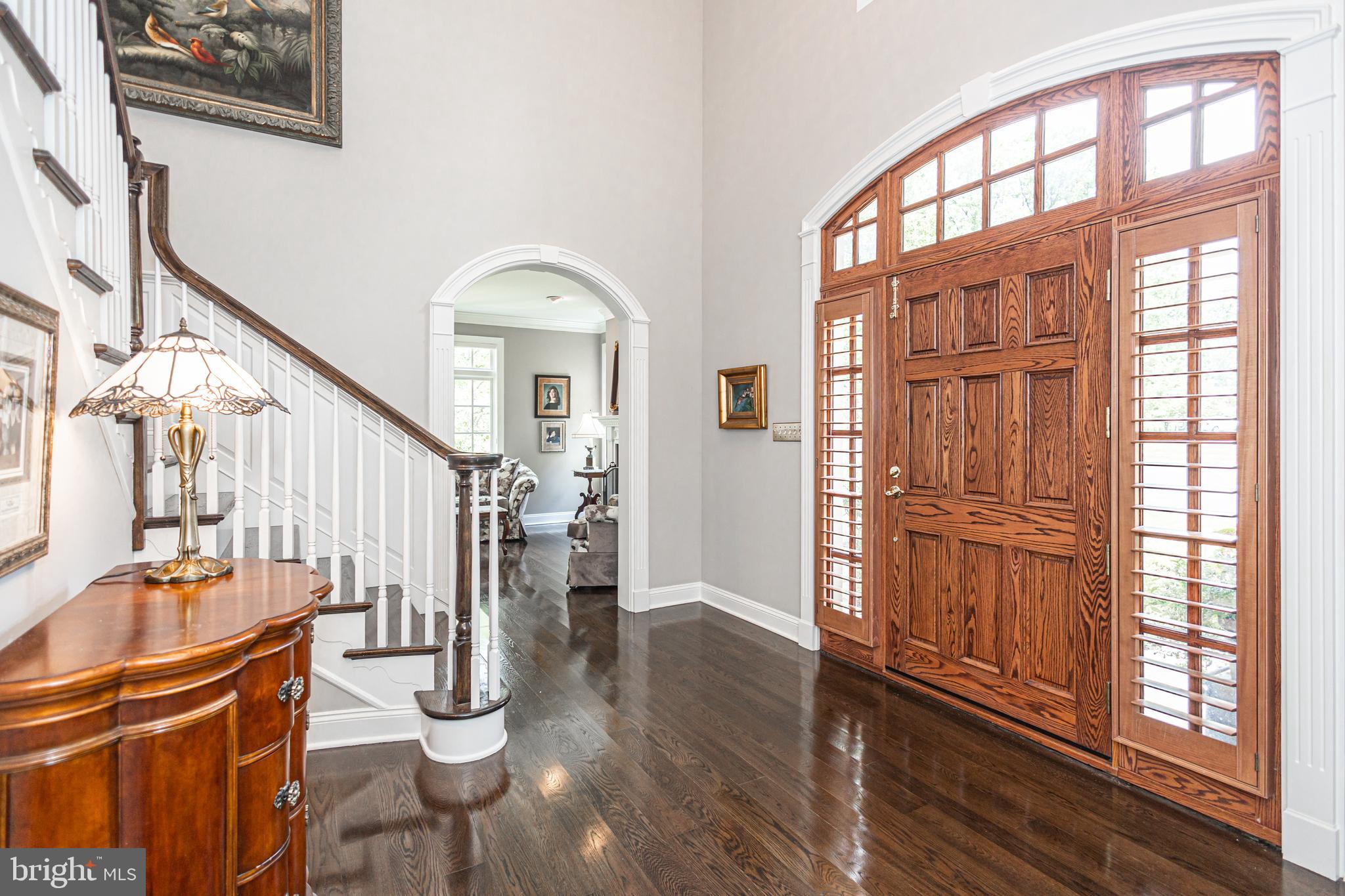 3380 Indian Springs Road Doylestown, PA 18902 - Photo 45 of 57 a livingroom with wooden floor an entryway