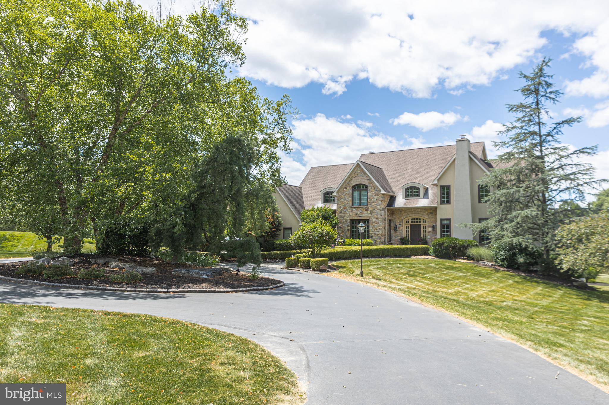 3380 Indian Springs Road Doylestown, PA 18902 - Photo 46 of 57 a view of a house with swimming pool and sitting area