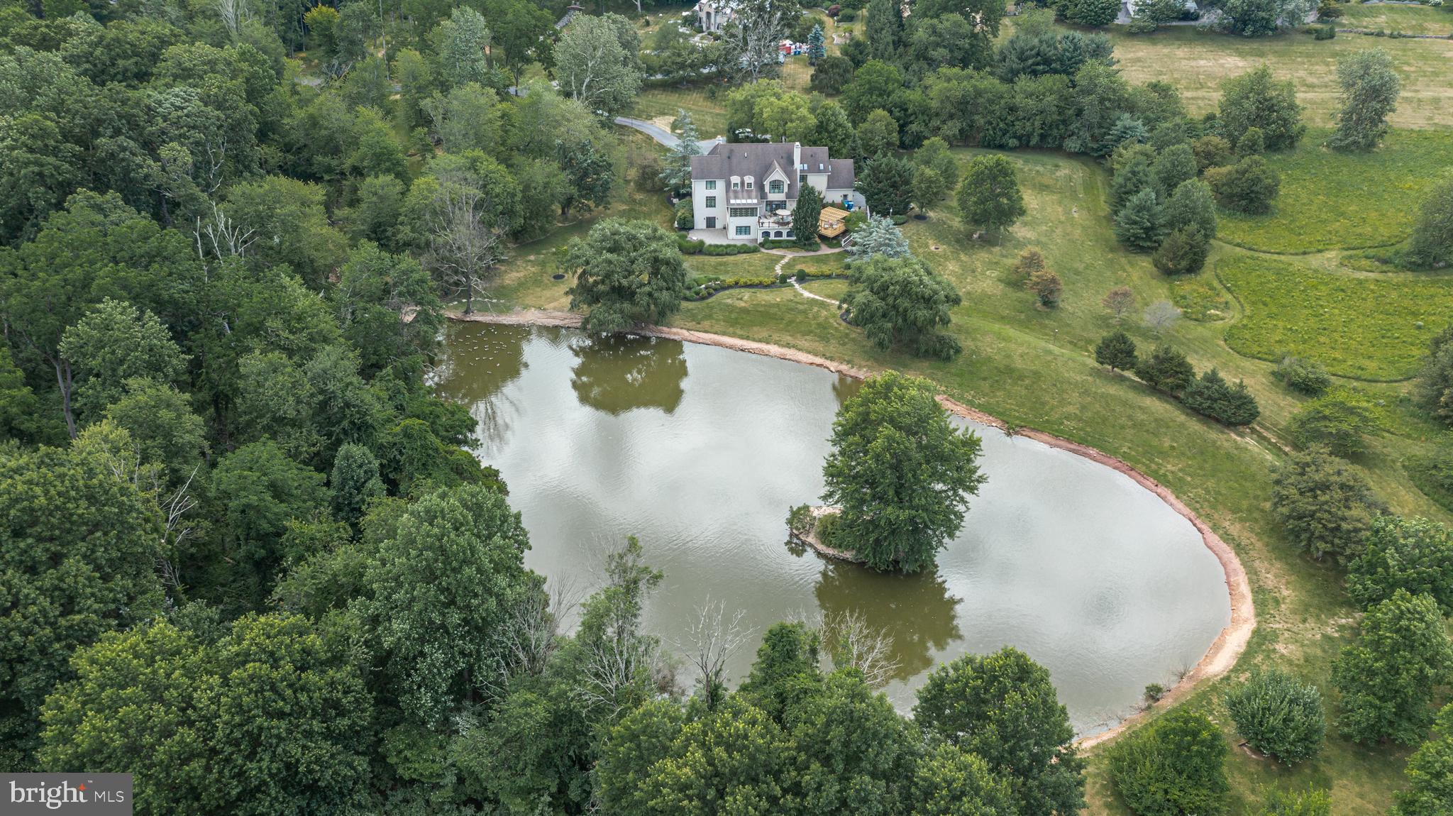 3380 Indian Springs Road Doylestown, PA 18902 - Photo 55 of 57 an aerial view of residential house with outdoor space and lake view