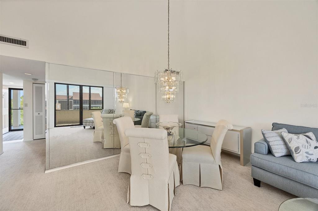 6285 Midnight Pass Road, Unit 403 Sarasota, FL 34242 - Photo 6 of 51 a view of a livingroom with furniture and window