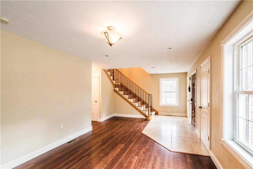 147 Heeter Road Knox, PA 16232 - Photo 15 of 40 wooden floor in an empty room with a window