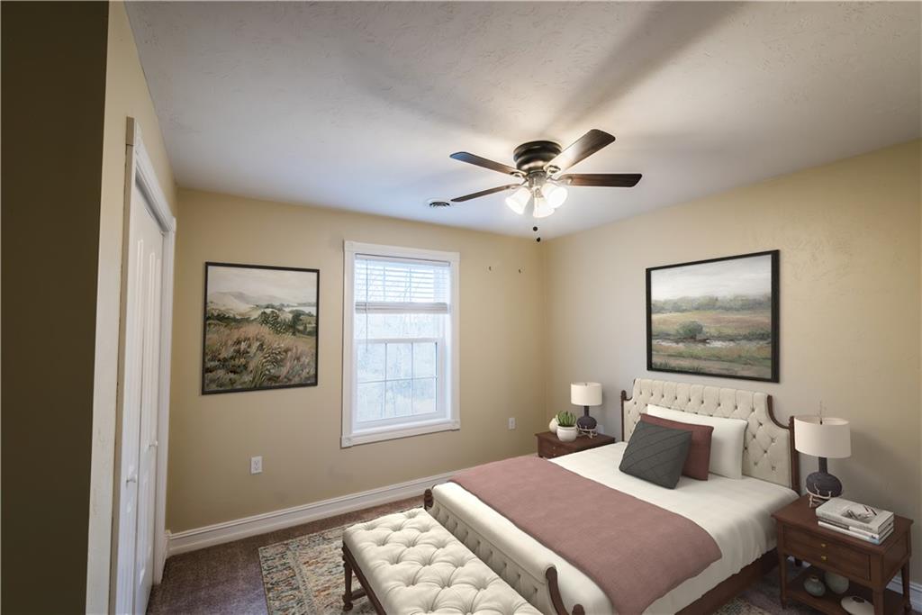 147 Heeter Road Knox, PA 16232 - Photo 22 of 40 a bedroom with a large bed and a window