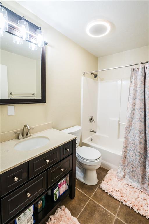 147 Heeter Road Knox, PA 16232 - Photo 27 of 40 a bathroom with a granite countertop sink toilet a large mirror and shower