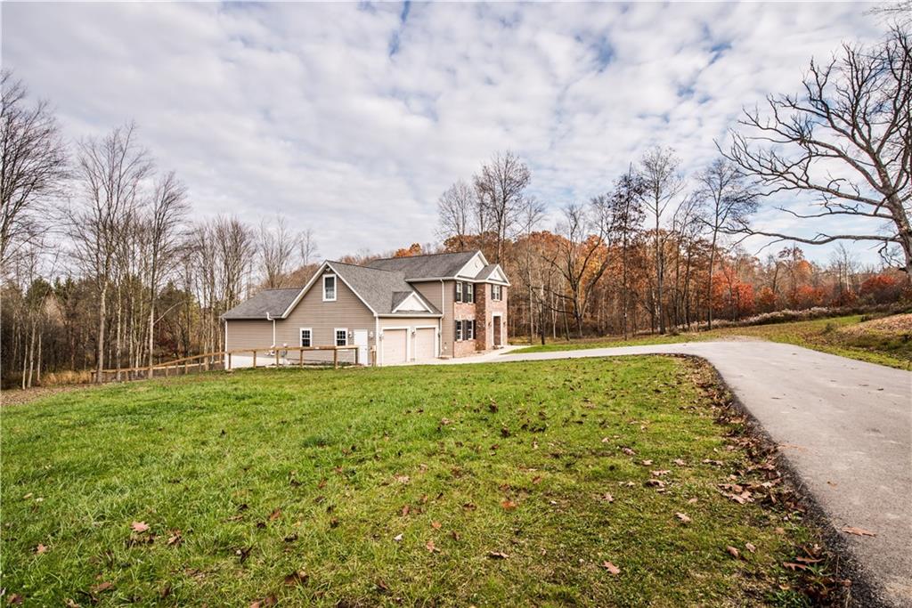 147 Heeter Road Knox, PA 16232 - Photo 39 of 40 a view of a big yard with potted plants and large trees