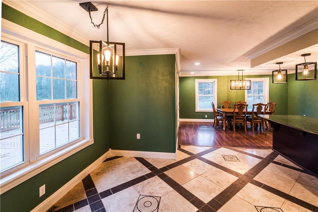 147 Heeter Road Knox, PA 16232 - Photo 9 of 40 a living room with furniture and a chandelier