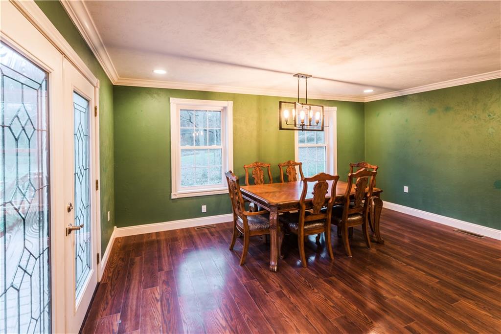 147 Heeter Road Knox, PA 16232 - Photo 10 of 40 a view of a dining room with furniture and wooden floor