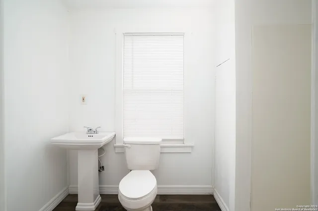 a view of room with window and ceiling fan