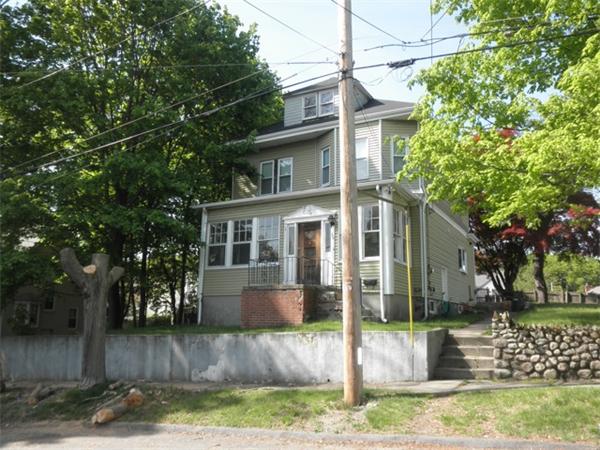 36 Jasper Street Saugus, MA 01906 - Photo 1 of 13 a view of a house with a yard