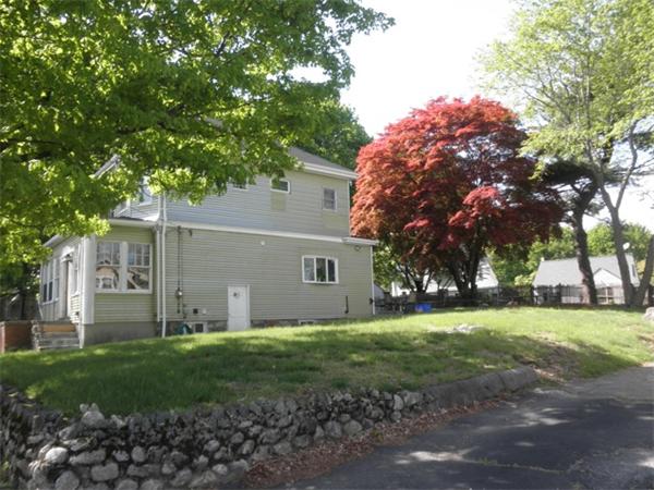 36 Jasper Street Saugus, MA 01906 - Photo 2 of 13 a view of a house with yard and tree s