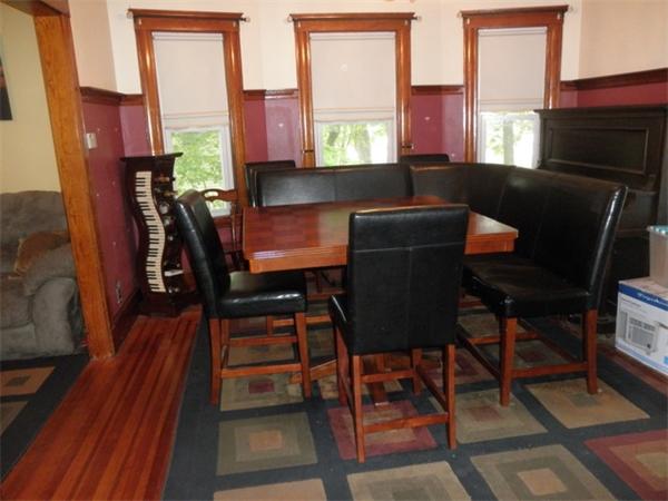 36 Jasper Street Saugus, MA 01906 - Photo 8 of 13 a living room with furniture and a fireplace