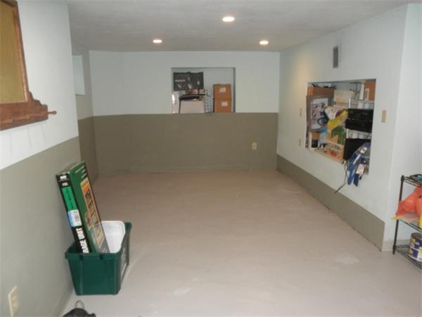 36 Jasper Street Saugus, MA 01906 - Photo 9 of 13 a view of kitchen with furniture and wooden floor