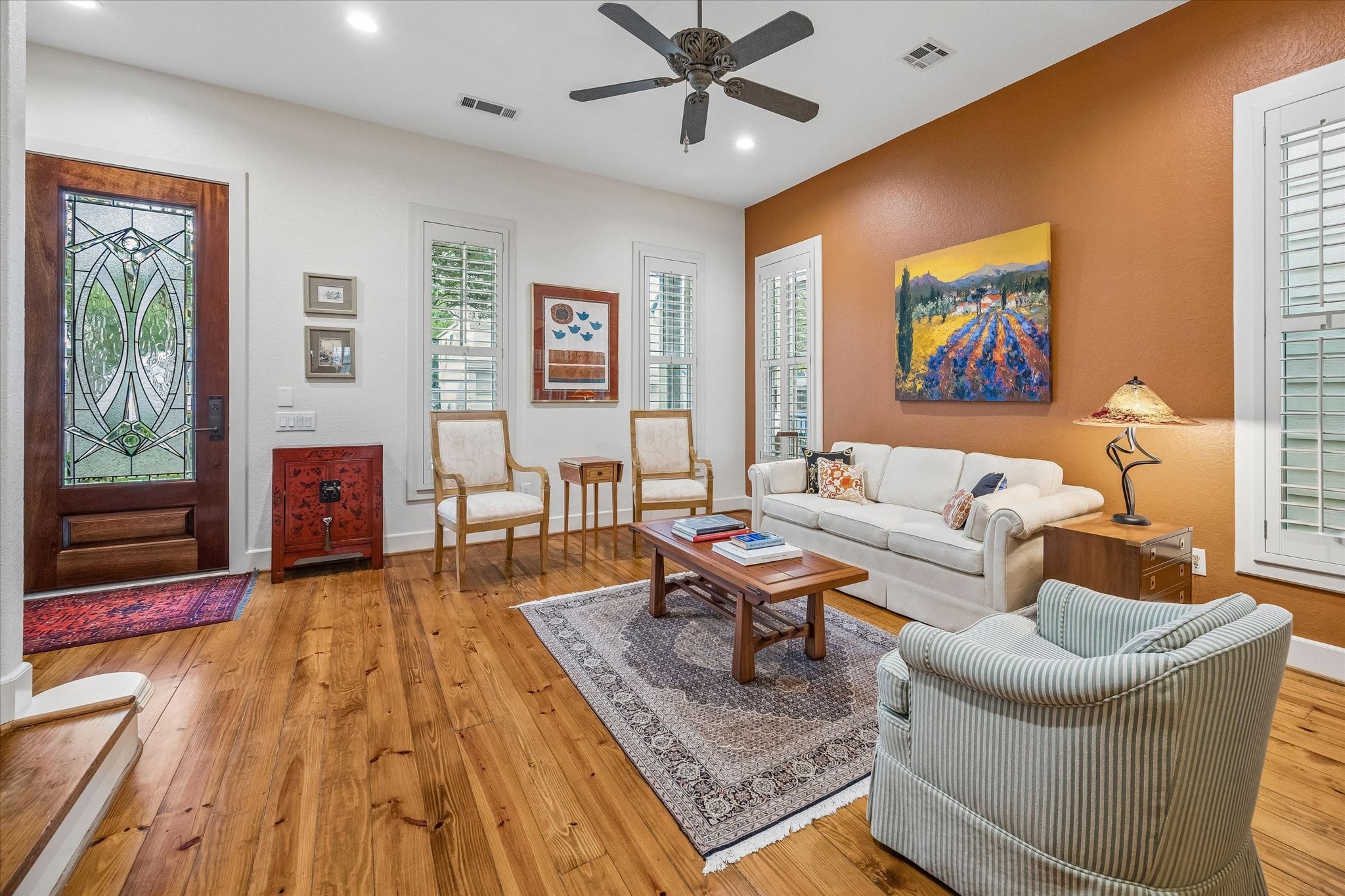 706 East 12th Street Houston, TX 77008 - Photo 10 of 34 a living room with furniture and a wooden floor