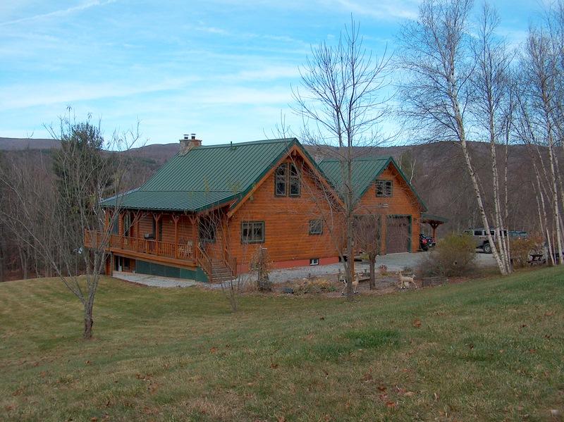 a house with trees in the background