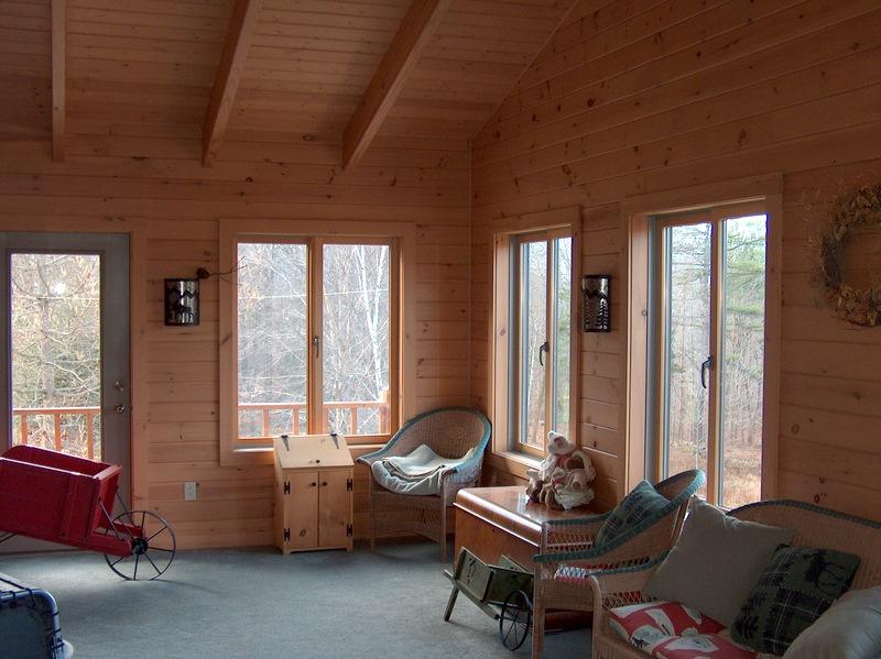 999 E Road Stamford, VT 05352 - Photo 10 of 14 a living room with furniture and a window