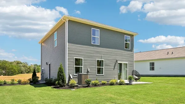 a front view of house with yard