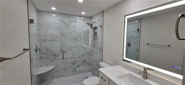 a bathroom with a sink and a toilet
