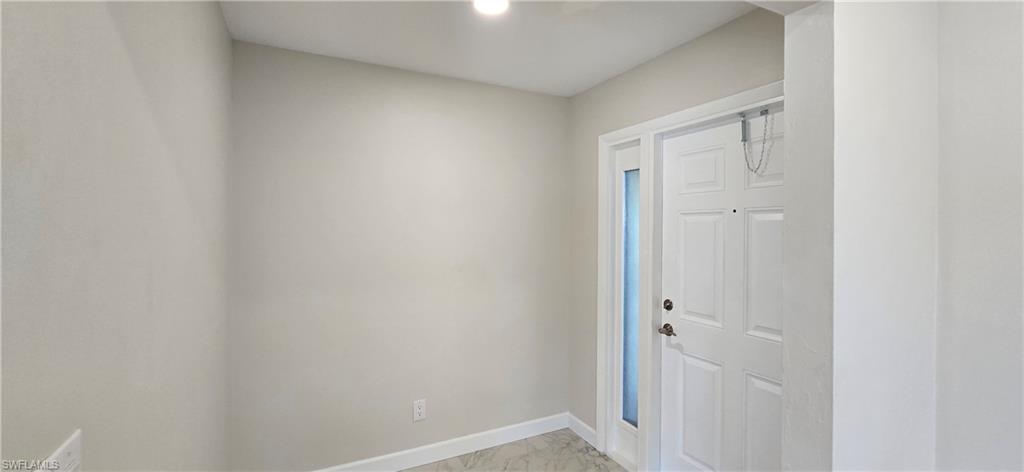 115 Georgetown Boulevard, Unit 115 Naples, FL 34112 - Photo 2 of 32 a view of an empty room