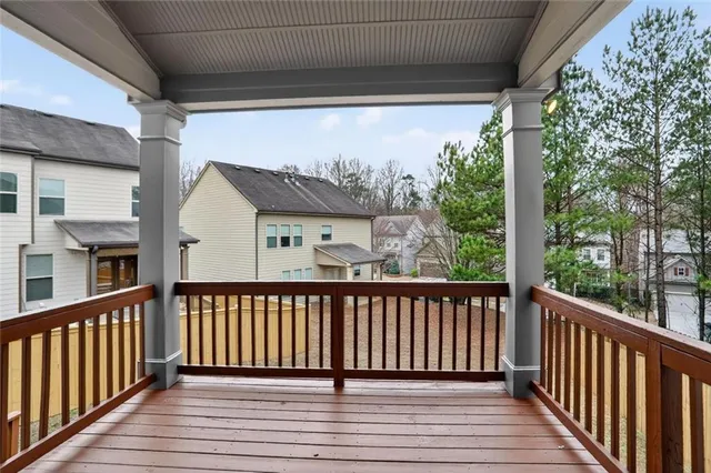 a view of a houses from a balcony