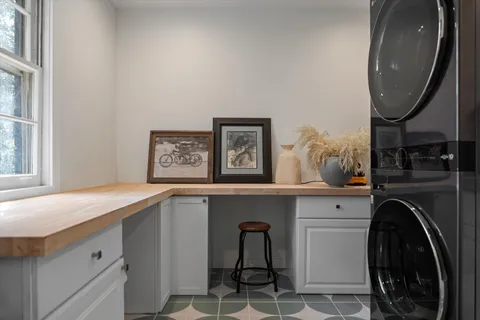 a view of a wooden house with a mountain view