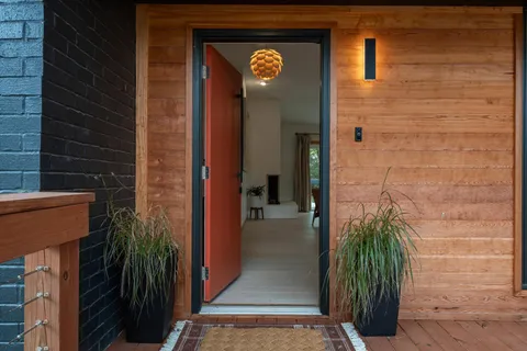 a workspace with furniture and window